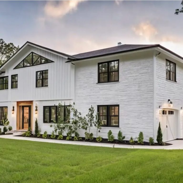 Modern two-story white house with large windows and landscaped front yard.